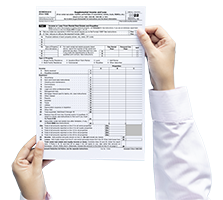 Signing a 1040 Schedule E Form